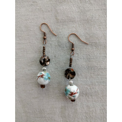 Boucle d'oreille porcelaine...