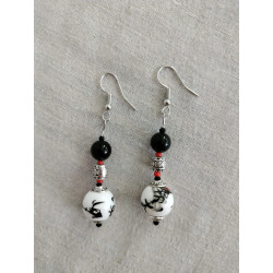 Boucle d'oreille soleil levant