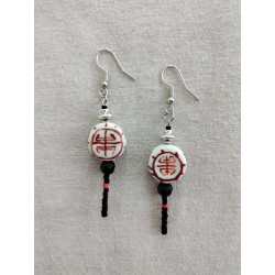 Boucle d'oreille soleil...