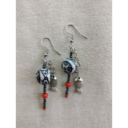 Boucle d'oreille porcelaine...